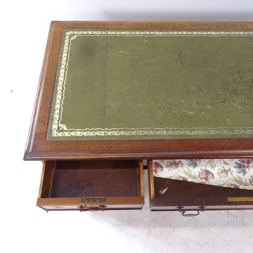 2282 - An Edwardian crossbanded mahogany twin-pedestal writing desk, with tooled and embossed green leather... 