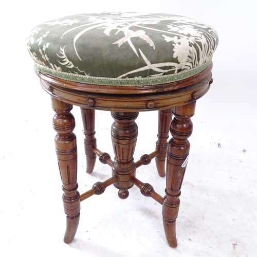 2283 - A Victorian mahogany revolving stool on 4 turned legs