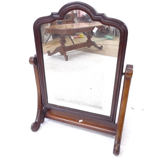 2295 - A Victorian mahogany-framed arch-top swing toilet mirror, W53cm, H72cm