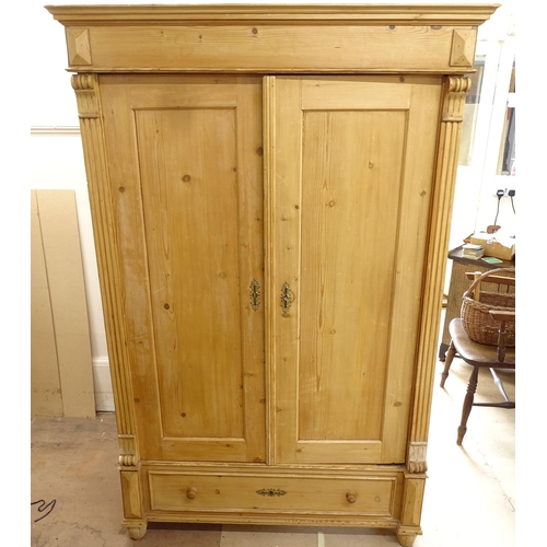 2301 - An Antique pine 2-door armoire with fitted drawer to base, W121cm, H187cm, D60cm (with key)