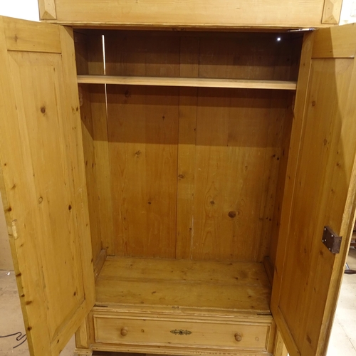 2301 - An Antique pine 2-door armoire with fitted drawer to base, W121cm, H187cm, D60cm (with key)