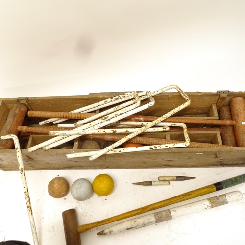 2504 - A Vintage garden croquet set in pine box