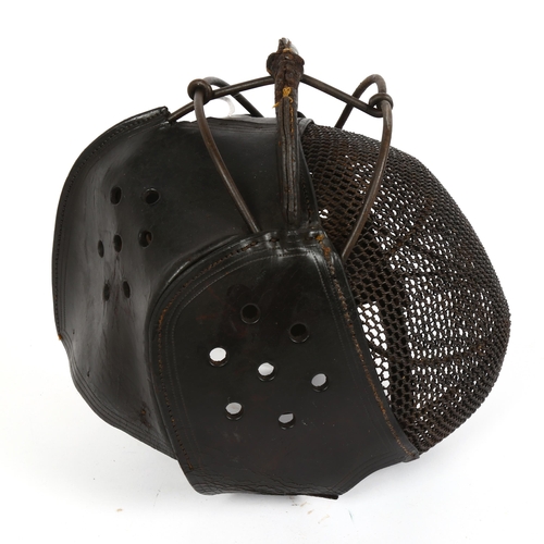 290 - A 19th century Italian iron and leather fencing mask, no maker's marks