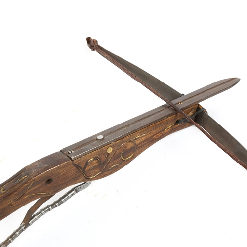 298 - A Medieval style crossbow, length 64cm