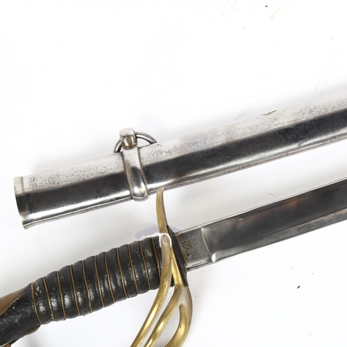 304 - An American 1864 pattern curved sword and scabbard, with brass hilt and leather grip, blade length 8... 