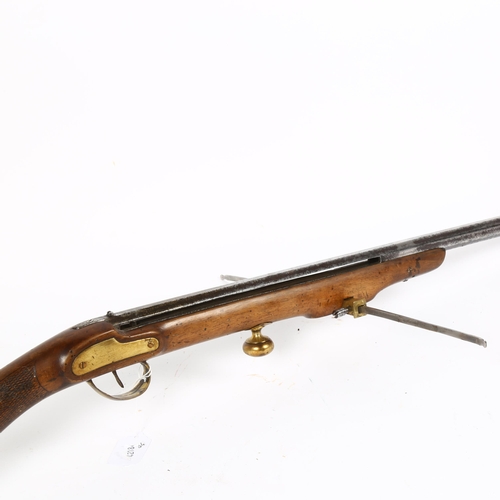 310 - An Antique rifle crossbow, with octagonal steel 70cm barrel