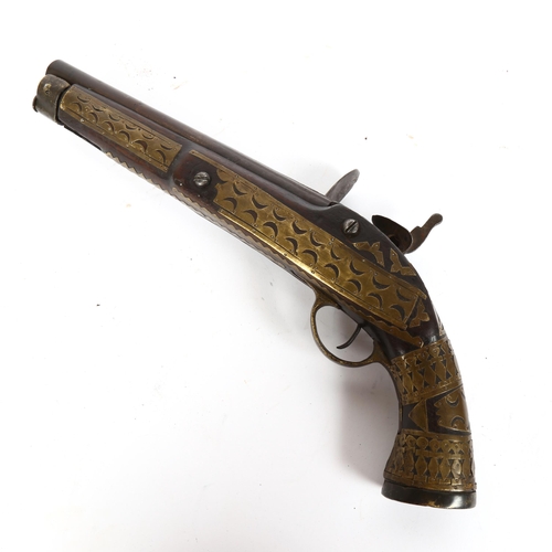 321 - A Middle Eastern brass-mounted flintlock pistol, barrel length 24cm