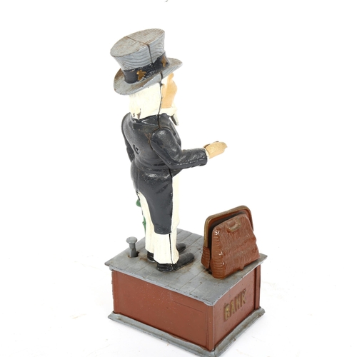 348 - A novelty cast-iron Uncle Sam money bank, height 28cm