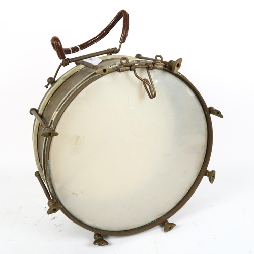 381 - A brass-mounted drum, diameter 36cm