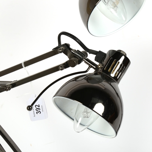 392 - A pair of modern black chrome anglepoise desk lamps