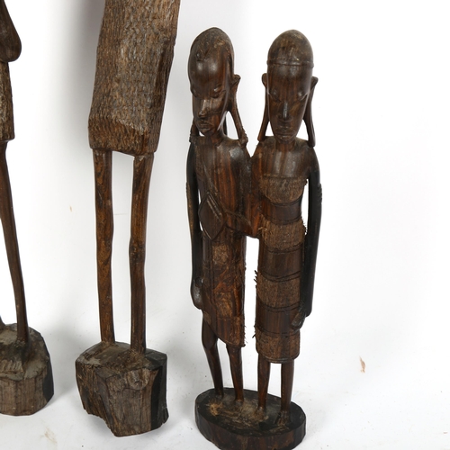 394 - 3 African Tribal carved hardwood figures, largest height 60cm (3)