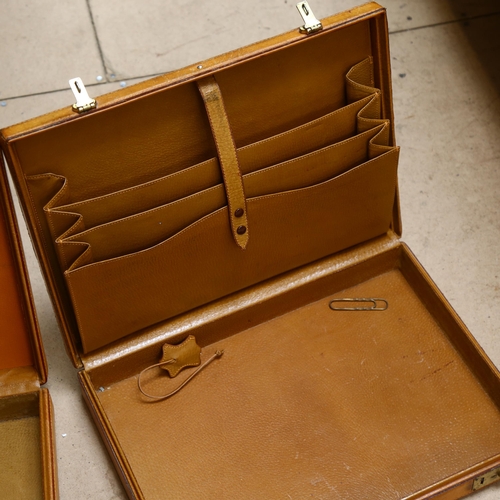 408 - 2 Antique tan leather briefcases, with brass locks, W44cm, H7.5cm, D32cm