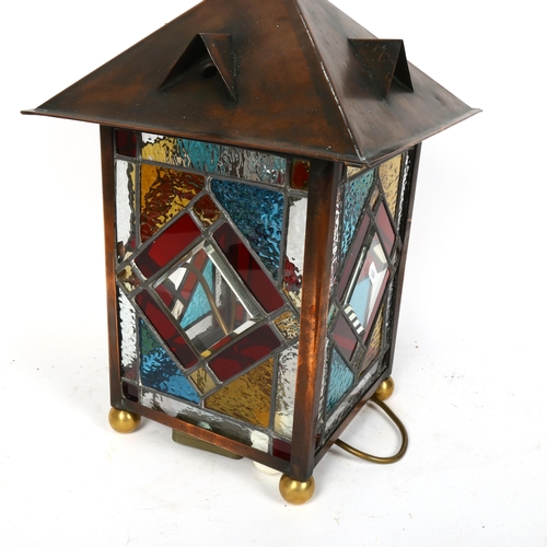 52 - A reproduction copper and stained glass lantern desk lamp, height 45cm, width 28cm