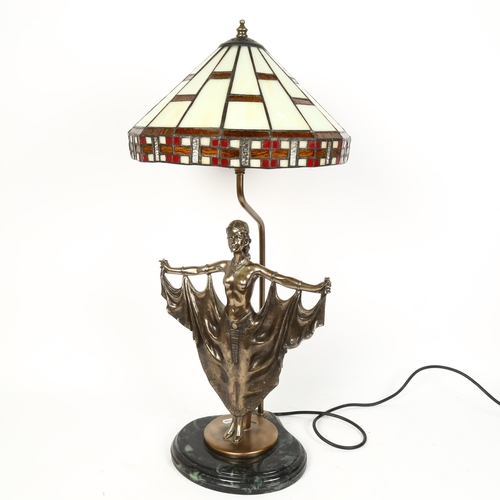 70 - A reproduction Tiffany style leadlight figural table lamp, with resin sculpture base, overall height... 