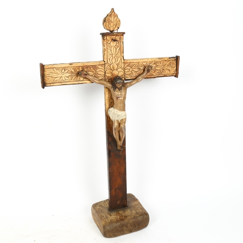 71 - A painted spelter and lacquer crucifix, height 51cm