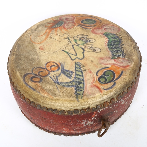 77 - An Eastern hand painted ceremonial drum, diameter 26cm