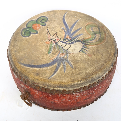 77 - An Eastern hand painted ceremonial drum, diameter 26cm