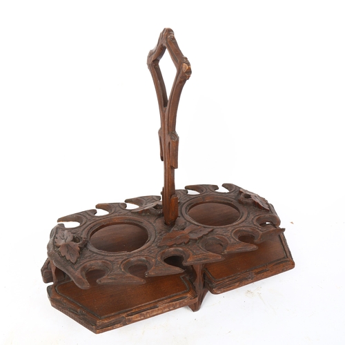 80 - A German Black Forest stained oak and pine decanter/bottle stand, length 34cm, height 32cm