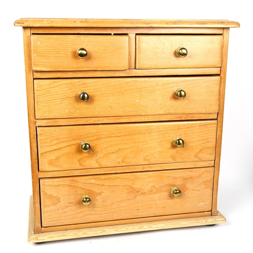 86 - A pine table-top chest of drawers, W47cm, H50cm, D22cm