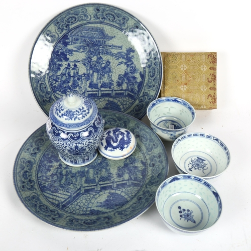 472 - Blue and white plates, tea bowls, ginger jar, and a boxed Chinese jar