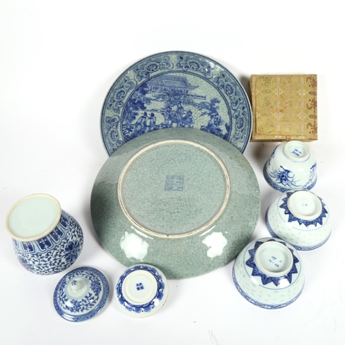 472 - Blue and white plates, tea bowls, ginger jar, and a boxed Chinese jar