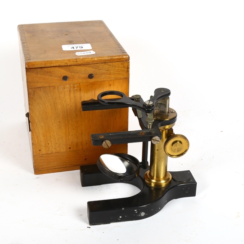 479 - A Vintage brass-mounted student's microscope, by Bausch & Lomb, New York, cased, height 16cm