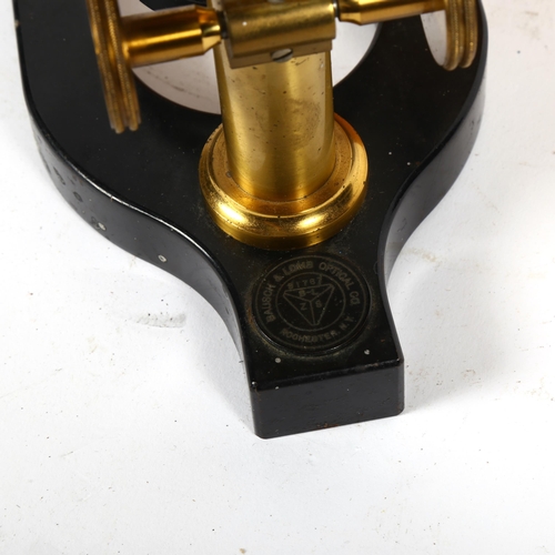 479 - A Vintage brass-mounted student's microscope, by Bausch & Lomb, New York, cased, height 16cm