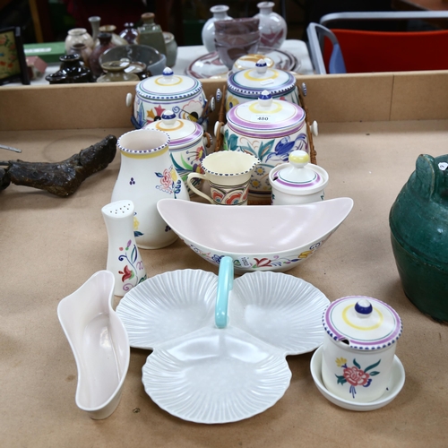 480 - A group of Poole pottery, including painted biscuit jars and covers, preserve pots etc