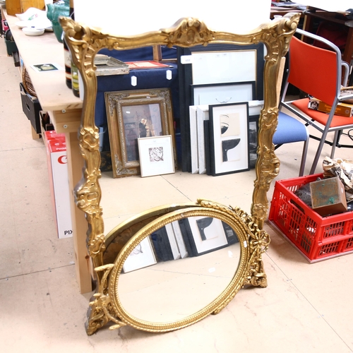 488 - A Vintage Marcel Korn mirror in embossed gilt frame, height 106cm, and a smaller oval mirror (A/F)