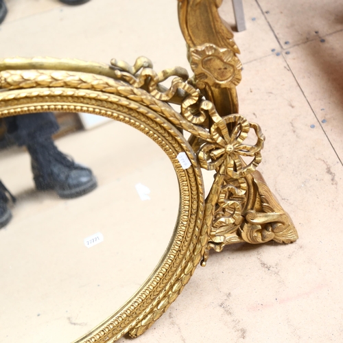 488 - A Vintage Marcel Korn mirror in embossed gilt frame, height 106cm, and a smaller oval mirror (A/F)