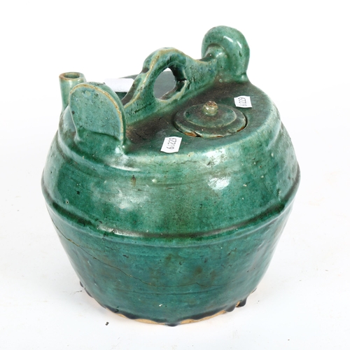 489 - A Chinese green glazed lidded vessel, height 20cm