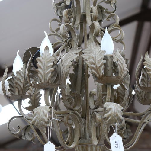 493 - A painted wrought-metal chandelier of foliate design, diameter 48cm approx