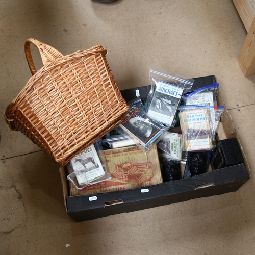 504 - A lidded basket, toy typewriter, marbles, Observer's books etc