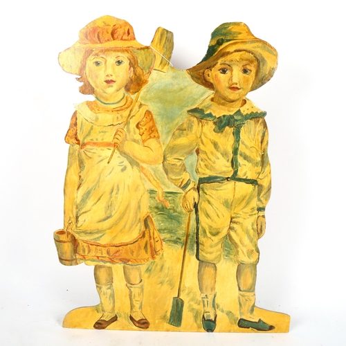 518 - A Vintage painted wood study of 2 children at the seaside, 81cm