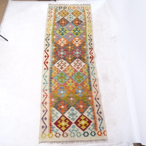 2304 - A Chobi Kilim runner, 251cm x 88cm