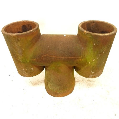 2694 - A terracotta chimney pot, W77cm, H61cm, D24cm