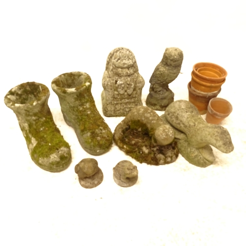 2695 - A group of weathered concrete garden ornaments (8), and terracotta pots (5)