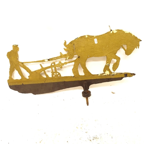 2698 - A painted metal wind vane, in the form of a ploughman and horse, L75cm