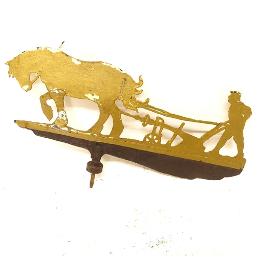 2698 - A painted metal wind vane, in the form of a ploughman and horse, L75cm