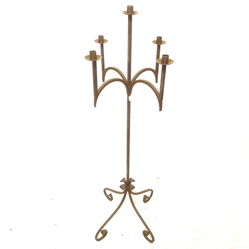 2700 - A wrought-iron floor-standing 4-arm candelabra, H132cm, W43cm