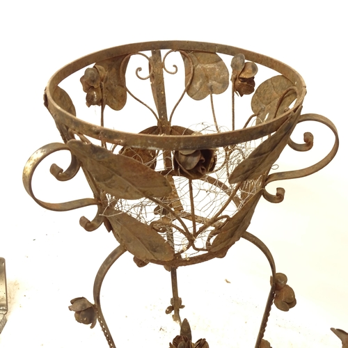 2704 - A pair of wrought-metal jardiniere stands, with floral decoration, W36cm, H92cm