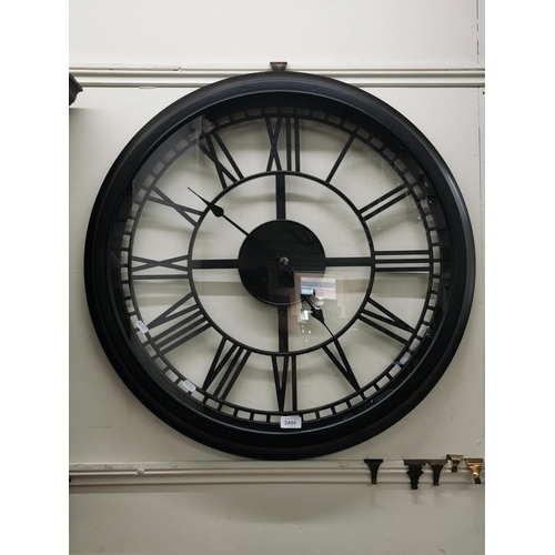 2428 - A modern open face wall clock with quartz movement, D 75cm