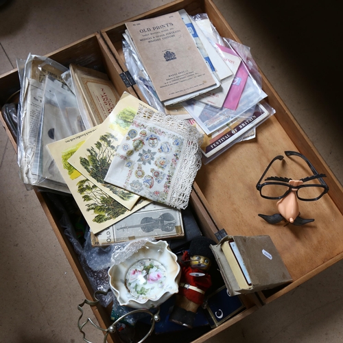 579 - A box containing football memorabilia, a bugle, dolls etc