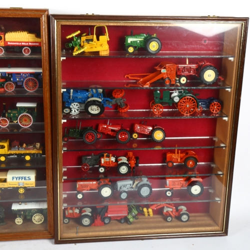 611 - 2 wall-mounted display cases with glass shelves, containing a collection of diecast toy lorries and ... 