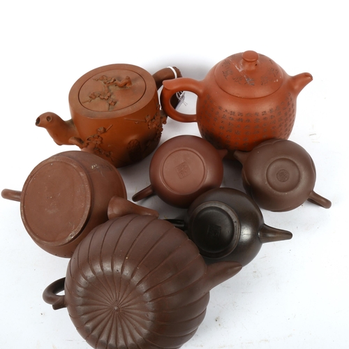 619 - A group of Oriental redware teapots, including 2 Yixing, 1 with applied blossom decoration, height 1... 