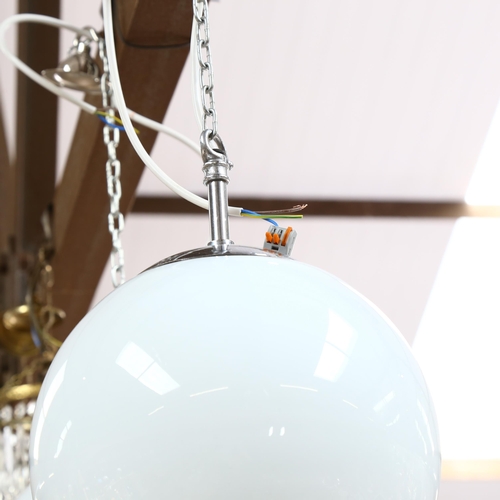 626 - A pair of milk glass globular pendant light fittings, diameter 22cm