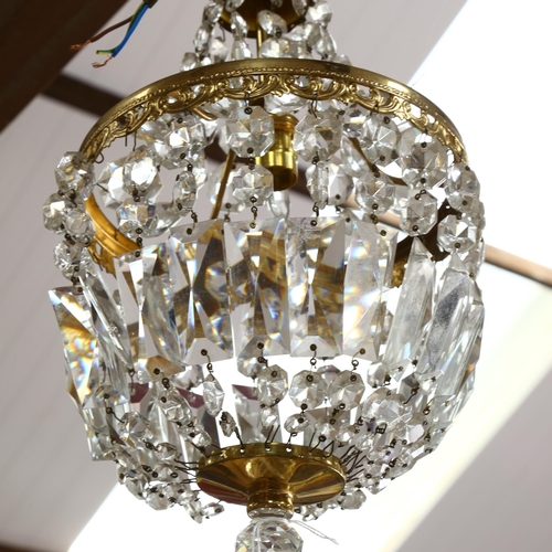 629 - A gilt-brass baguette chandelier with lustre drops, 18cm across