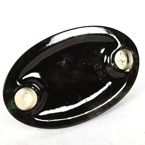 661 - A table centre bowl supported by 4 black cats, titled Safari, by Veda, 32cm