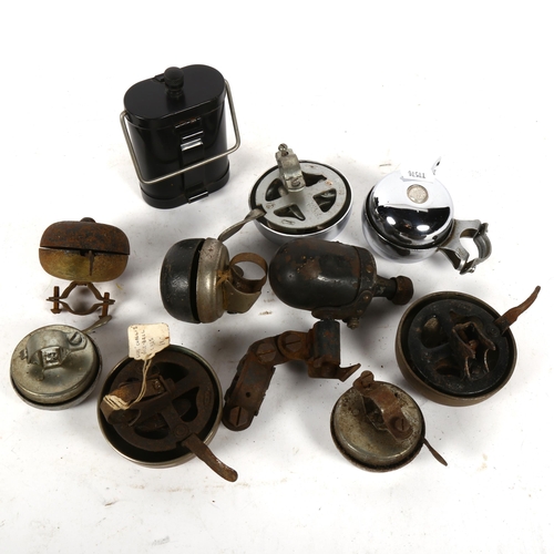 666 - A collection of bicycle bells, and a blackout lamp