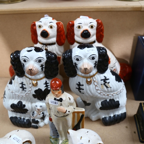 706 - Reproduction Staffordshire figures, including figures Spaniels and cricketer, largest height 30cm